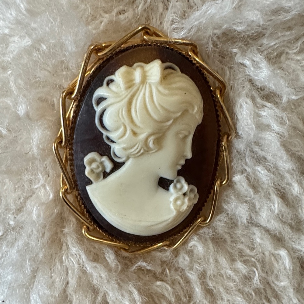 Elegant Gold and Cream Cameo Brooch